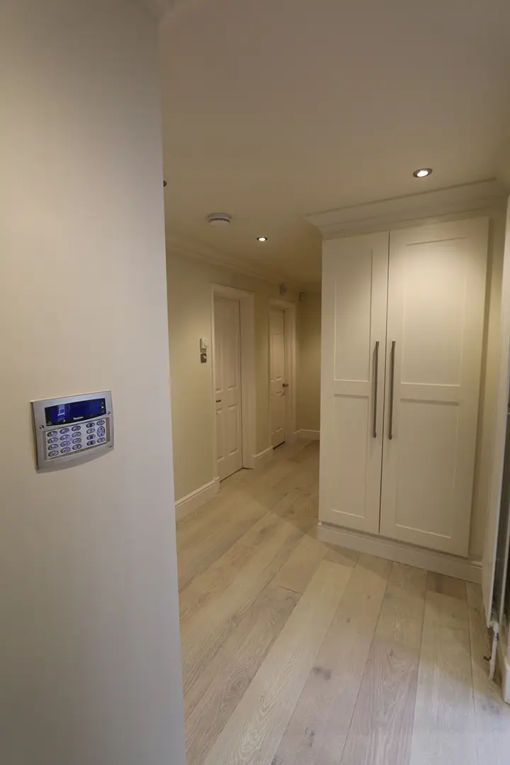 Hallway with integrated storage and lighting controls