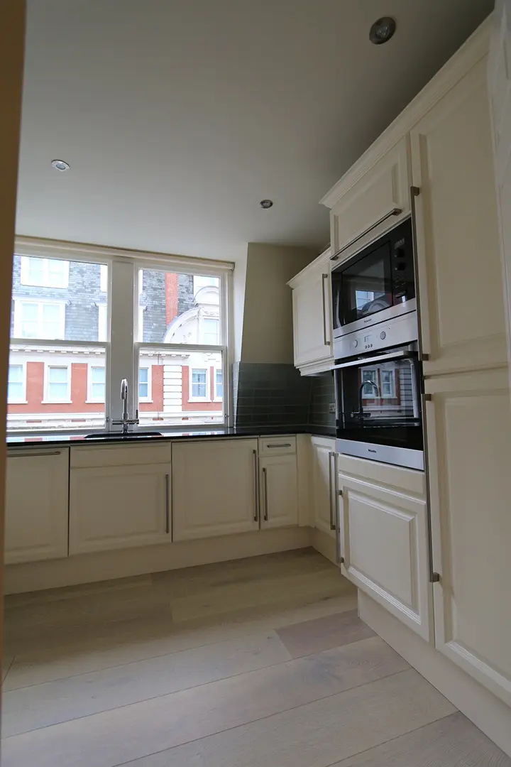 Light-filled fitted kitchen overlooking central London