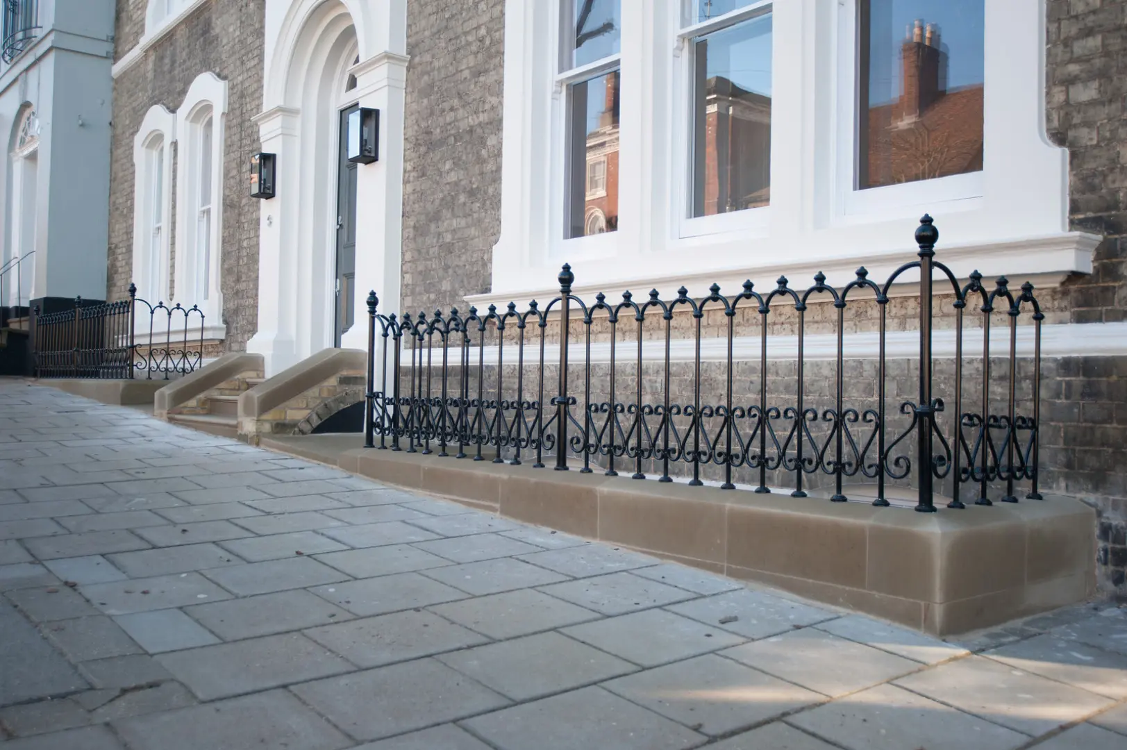 Restored stone steps and iron railings to the villa