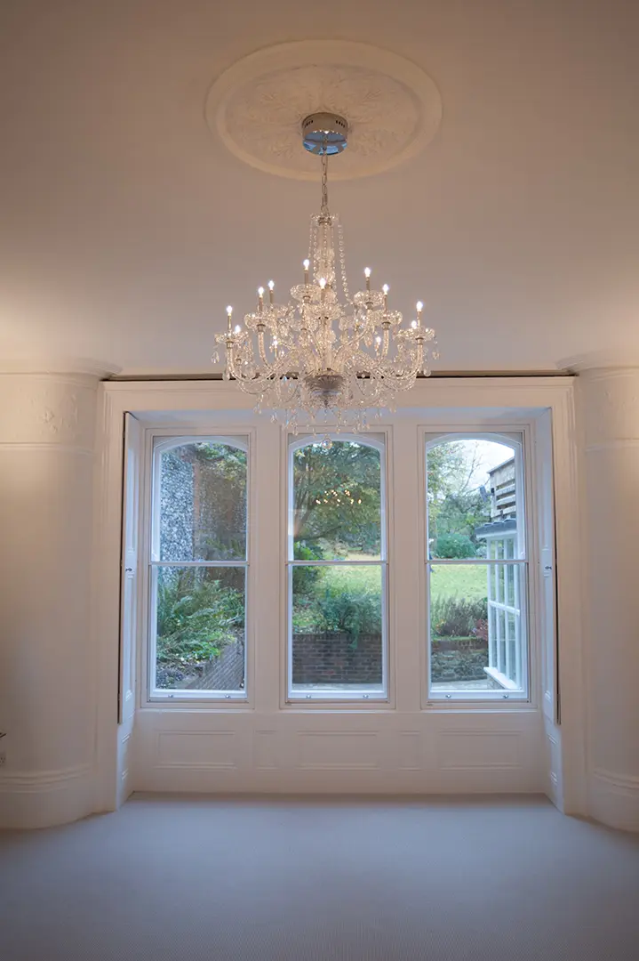 Decorative plaster ceiling rose and chandelier