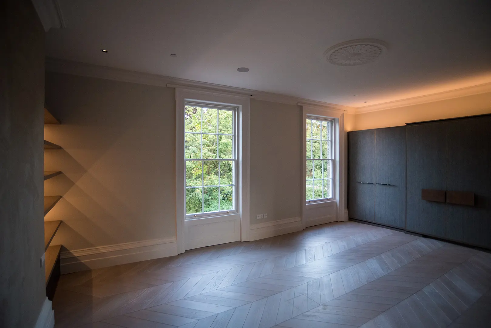 Light-filled marble shower room within the listed townhouse